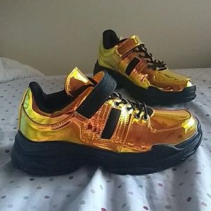 Brand new Dolls Kill golden sneakers